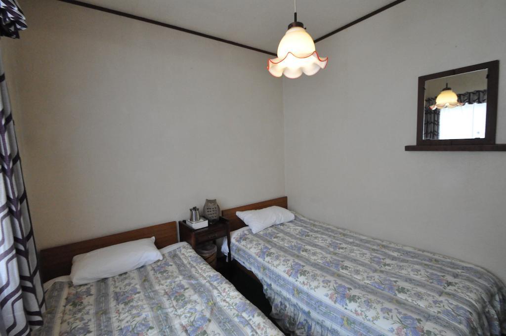 Guest House Wind Inn Hakuba Quarto foto